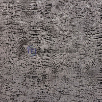 A close-up macro shot showcasing the intricate, embossed metallic and distressed pattern of a modern textured wall covering