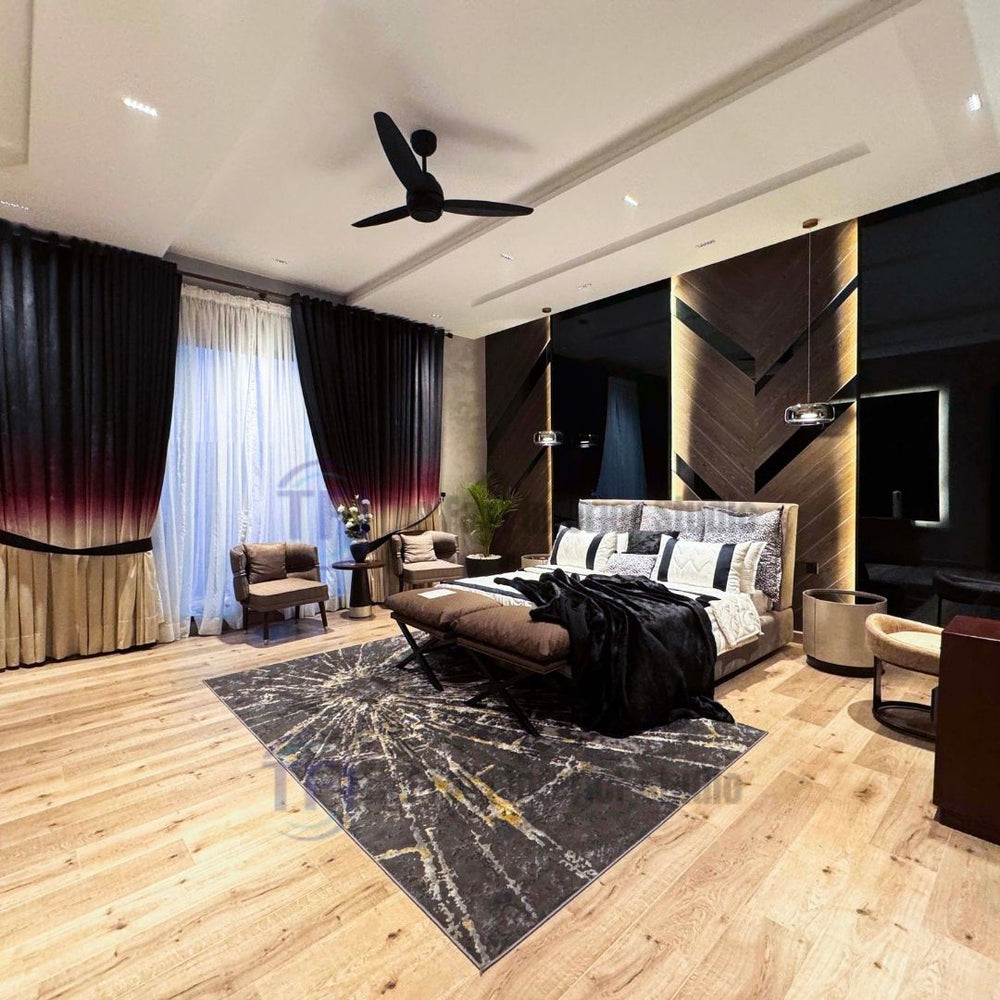 A grand master bedroom featuring dramatic dark-to-light gradient curtains, a dark accent wall, and a dark rug with gold lines, all grounded by premium AGT knotted light oak laminate flooring
