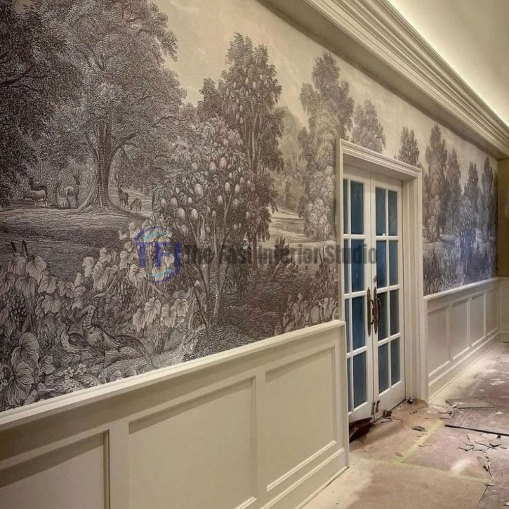 A long interior hallway featuring a classic monochrome etched forest landscape mural wallpaper installed seamlessly above white wainscoting paneling