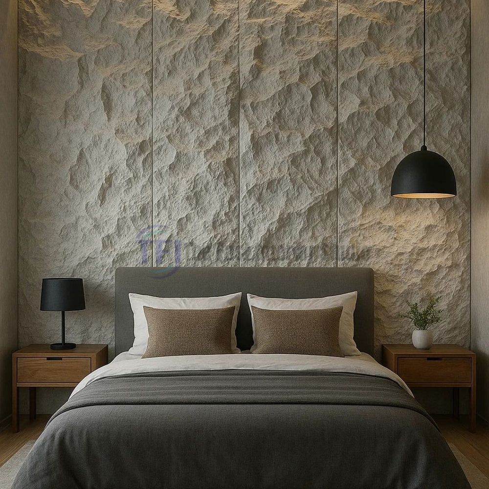 A luxury bedroom featuring a deeply textured light stone 3D PU feature wall acting as a dramatic headboard backdrop, accented by a modern black pendant light