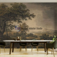 A sophisticated dining room featuring a moody vintage landscape mural wallpaper serving as a backdrop for a white marble table and dark green chairs