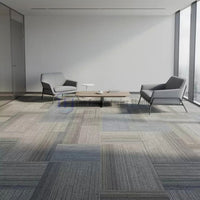 Best mixed grey and blue patterned carpet tiles installed in a professional executive lounge area