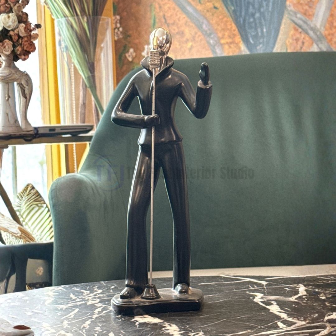 Close up of abstract musician figurine styling on a living room table