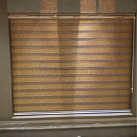 Elegant bronze textured zebra blinds providing daytime light filtering