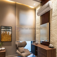 Elegant roller blinds filtering sunlight in a modern living lounge