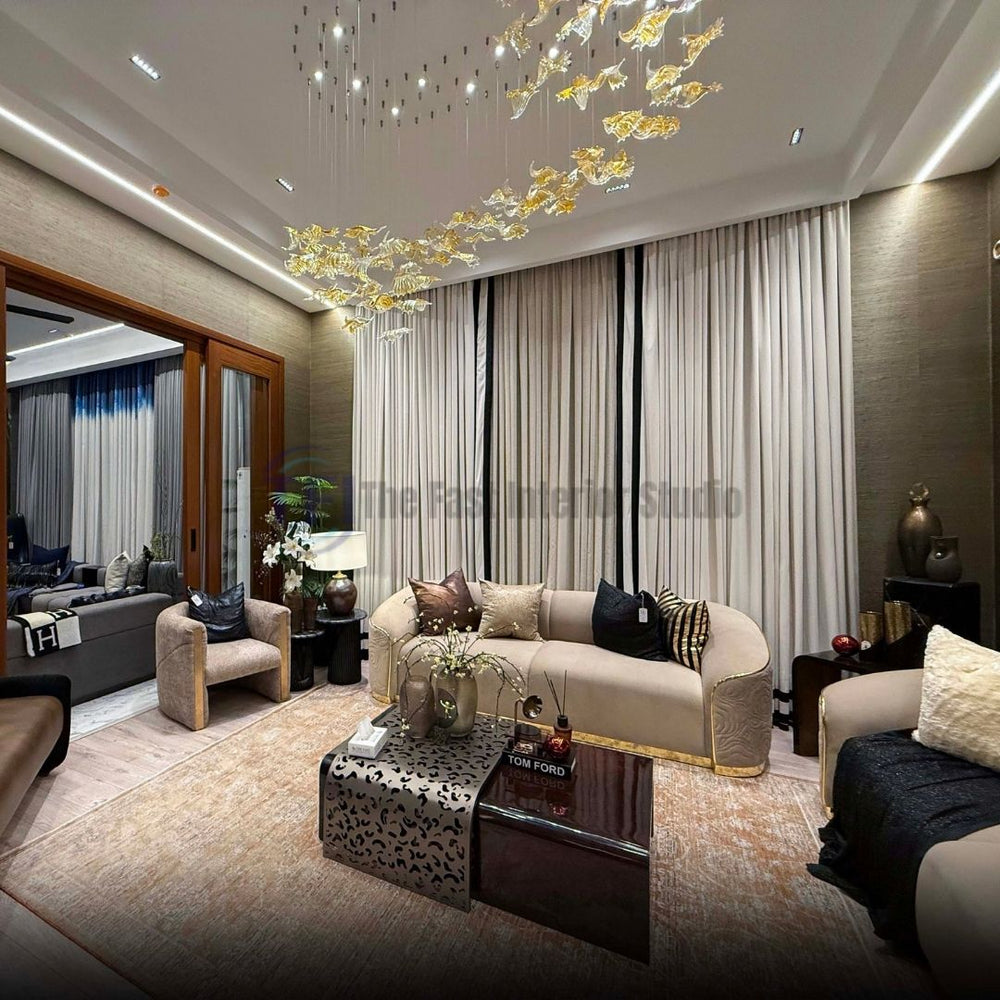 Floor-to-ceiling tailored beige curtains with vertical black accent stripes near a modern living room setup