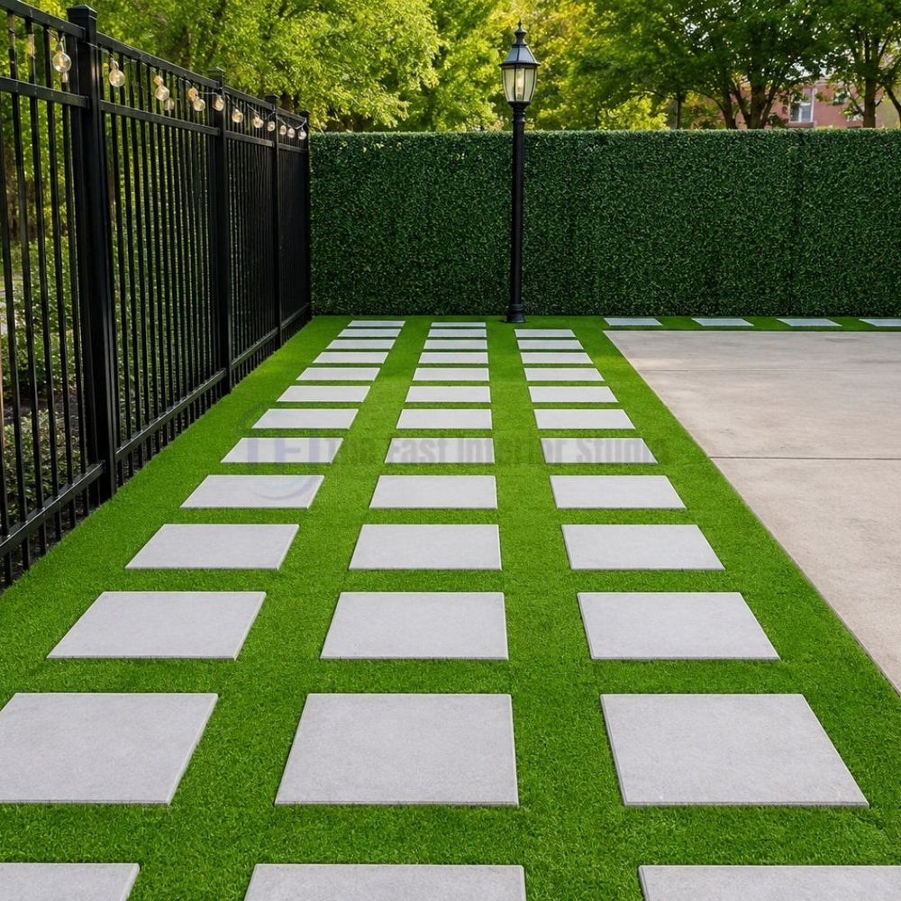 Garden pathway with concrete stepping stones and premium artificial grass