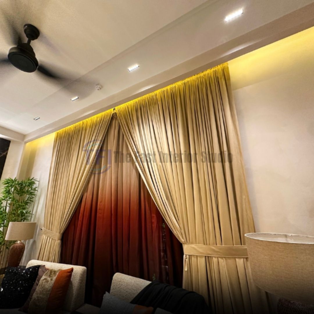 Layered beige and rust ombre curtains in a modern living room