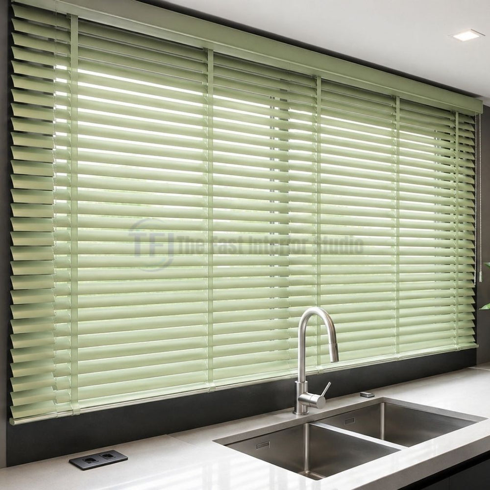 Moisture resistant sage green Venetian blinds over a modern kitchen sink