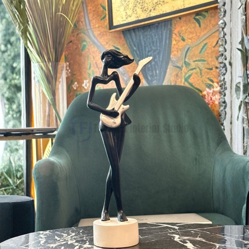 Premium modern female musician figurine styled for versatile home decor in Pakistan and worldwide