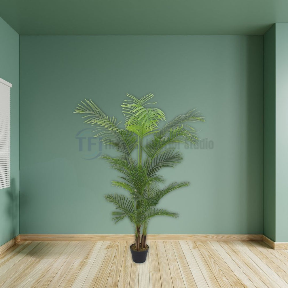 Tall 6-foot artificial palm plant in a small black pot positioned in a green room