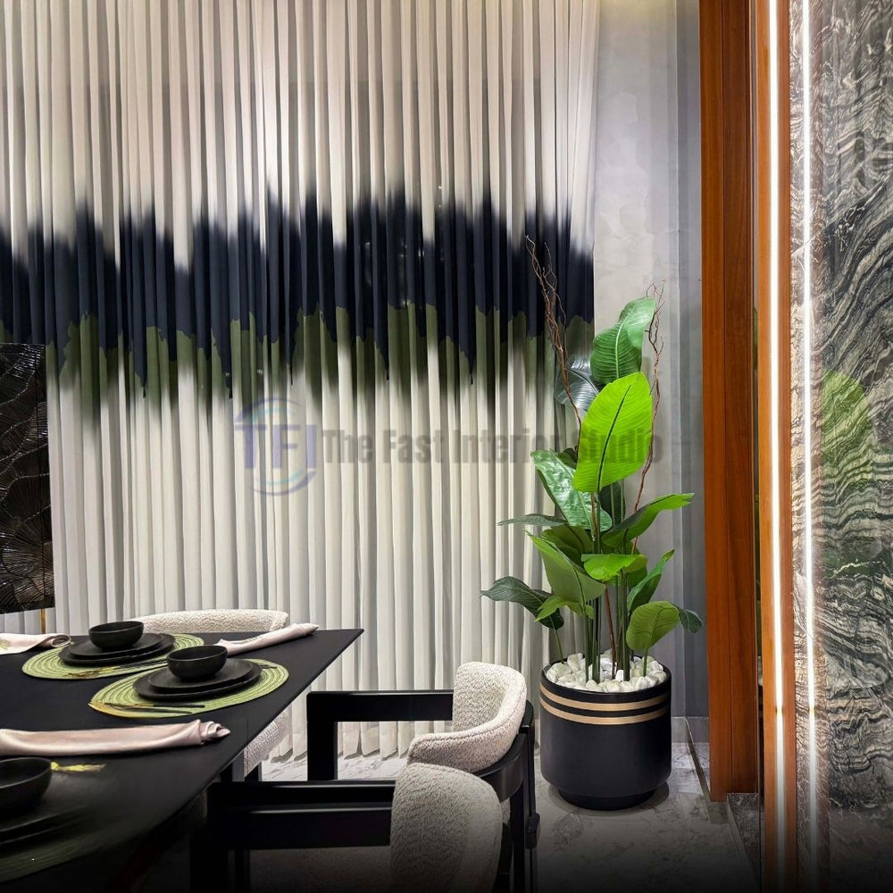 White pleated curtains featuring a striking black and green horizontal band