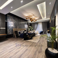 Wide view of a luxury bedroom suite showcasing continuous grey-brown wood laminate flooring reflecting warm light from a modern gold chandelier
